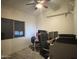 Office space with a large window, desk, and rolling office chair at 16426 N 49Th St, Scottsdale, AZ 85254