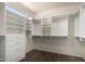 Organized walk-in closet featuring custom shelves and storage solutions at 20017 N Cielo Ct, Surprise, AZ 85374