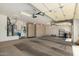Spacious garage with built-in cabinets, water heater, and ample room for storage at 20017 N Cielo Ct, Surprise, AZ 85374