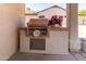 Close up shot of outdoor kitchen featuring built-in grill, ideal for outdoor cooking at 20017 N Cielo Ct, Surprise, AZ 85374