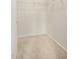 Spacious walk-in closet with neutral walls, carpeted floors, and a wire shelf at 20017 N Cielo Ct, Surprise, AZ 85374