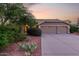 Charming single-story home featuring a three-car garage and desert landscaping at 29670 N 46Th St, Cave Creek, AZ 85331