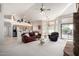 Open living room featuring vaulted ceilings and access to the kitchen at 29670 N 46Th St, Cave Creek, AZ 85331