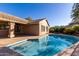 Backyard pool featuring cool blue water, desert landscaping, and tiled roof at 29670 N 46Th St, Cave Creek, AZ 85331