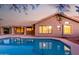 Backyard pool with tile trim and home in background during sunset with clear water at 29670 N 46Th St, Cave Creek, AZ 85331