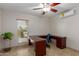 Office featuring a window, neutral walls, and large desk at 3433 E Betty Elyse Ln, Phoenix, AZ 85032