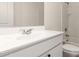 Well-lit bathroom features a modern vanity, ample counter space, and a shower-tub combination at 36025 W Santa Clara Ave, Maricopa, AZ 85138