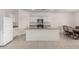 Kitchen featuring an island with granite countertops and stainless steel appliances at 36025 W Santa Clara Ave, Maricopa, AZ 85138