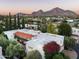 Picturesque aerial view of the property with mountains in the background and lush greenery and landscape at 4316 N 40Th St, Phoenix, AZ 85018