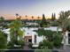 Stunning aerial view of the estate showcasing lush landscaping and a tranquil residential setting at sunset at 4316 N 40Th St, Phoenix, AZ 85018