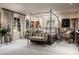 Elegant bedroom showcasing a four-poster bed and sitting area at 4316 N 40Th St, Phoenix, AZ 85018