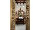 Elegant dining room with carved wood doors, a chandelier, and stained glass windows at 4316 N 40Th St, Phoenix, AZ 85018