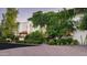 An exterior shot of a home displaying unique architectural details and mature greenery at 4316 N 40Th St, Phoenix, AZ 85018