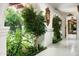 Hallway with lush foliage creating a seamless indoor/outdoor experience at 4316 N 40Th St, Phoenix, AZ 85018