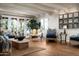 Bright living room with hardwood floors, French doors, and comfortable seating at 4316 N 40Th St, Phoenix, AZ 85018