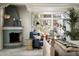 This gorgeous bedroom features a tiled fireplace, large windows, and charming decor at 4316 N 40Th St, Phoenix, AZ 85018