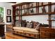 Cozy sitting area with built-in shelving, decorative pillows, and hardwood floors at 4316 N 40Th St, Phoenix, AZ 85018