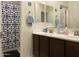 This bathroom features a double vanity, tiled shower, and is nicely appointed at 500 W Nikita Dr, San Tan Valley, AZ 85140
