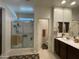 This spacious bathroom has a shower and dual sink vanity at 500 W Nikita Dr, San Tan Valley, AZ 85140