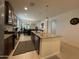 This kitchen features a large island and a view of the living and dining areas at 500 W Nikita Dr, San Tan Valley, AZ 85140