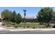 Community park with mature trees, playground, and walking paths at 500 W Nikita Dr, San Tan Valley, AZ 85140