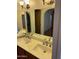 This bathroom boasts a double sink vanity with a large mirror at 6223 N 12Th St # 1, Phoenix, AZ 85014