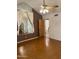 This bedroom features a mirror, fan, and doorway to other rooms at 6223 N 12Th St # 1, Phoenix, AZ 85014