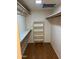 A walk-in closet featuring a shelving unit and built-in clothes racks at 6223 N 12Th St # 1, Phoenix, AZ 85014