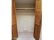 A walk-in closet featuring wooden doors and ample storage space at 6223 N 12Th St # 1, Phoenix, AZ 85014
