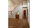 Staircase featuring a wet bar area, and a view of the home's entryway at 6223 N 12Th St # 1, Phoenix, AZ 85014