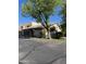 Beige two-story home featuring a tile roof and low-maintenance landscaping at 6223 N 12Th St # 1, Phoenix, AZ 85014