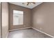 Bedroom featuring a window and neutral paint at 8354 W Marlette Ave, Glendale, AZ 85305