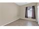 Bedroom featuring a window and neutral paint at 8354 W Marlette Ave, Glendale, AZ 85305