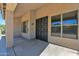 Charming front entrance featuring dual doors and sidelight windows, set under a covered porch at 8354 W Marlette Ave, Glendale, AZ 85305