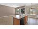Kitchen island with dishwasher open to living space and backyard access at 8354 W Marlette Ave, Glendale, AZ 85305