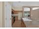 Bright kitchen with wood cabinets and black appliances at 8354 W Marlette Ave, Glendale, AZ 85305