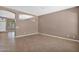 Open living space with tiled floors, neutral paint and natural light at 8354 W Marlette Ave, Glendale, AZ 85305