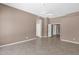 Living room featuring neutral paint and multiple doorways at 8354 W Marlette Ave, Glendale, AZ 85305