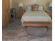 This bedroom features an ornate bed frame, neutral tones, and a comfortable place to rest at 9728 N 106Th Pl # 154, Scottsdale, AZ 85258