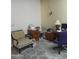 Functional home office with a comfortable chair, desk, and good lighting at 9728 N 106Th Pl # 154, Scottsdale, AZ 85258