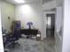 Bright office space with desk, rolling chair, neutral walls, and natural light at 9728 N 106Th Pl # 154, Scottsdale, AZ 85258