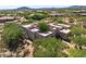 Aerial view of property showing the roofline, landscaping, and surrounding community at 10119 E Winter Sun Dr, Scottsdale, AZ 85262