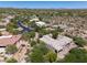 An aerial view of the community highlighting the spacious desert home sites and desert landscaping at 10119 E Winter Sun Dr, Scottsdale, AZ 85262