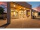 Spacious outdoor patio with a built-in grill, ceiling fan and seamless indoor-outdoor flow is ideal for entertaining at 10119 E Winter Sun Dr, Scottsdale, AZ 85262