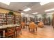 Cozy library with extensive bookshelves, comfortable seating and tables for reading at 10330 W Thunderbird Blvd # C207, Sun City, AZ 85351