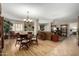 Open floor plan featuring a dining table and living room, great for entertaining guests at 10330 W Thunderbird Blvd # C207, Sun City, AZ 85351