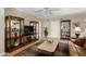 Open living room featuring built in storage shelves and a large neutral colored rug at 10330 W Thunderbird Blvd # C207, Sun City, AZ 85351