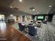Inviting lounge area with stylish seating and large screen television at 10330 W Thunderbird Blvd # C207, Sun City, AZ 85351