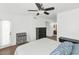 Bright bedroom with white walls, ceiling fan, and private en suite bathroom with modern features at 1075 E Chandler Blvd # 210, Chandler, AZ 85225