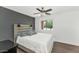 Comfortable bedroom with natural light and neutral decor, creating a relaxing atmosphere at 1075 E Chandler Blvd # 210, Chandler, AZ 85225